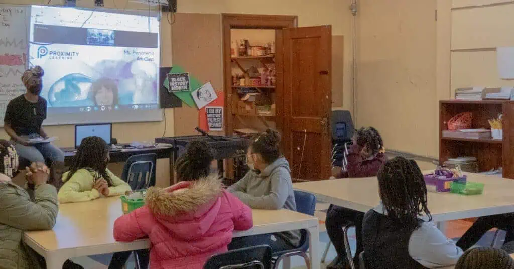 Proximity Learning virtual classroom with students and teacher engaging in remote learning.