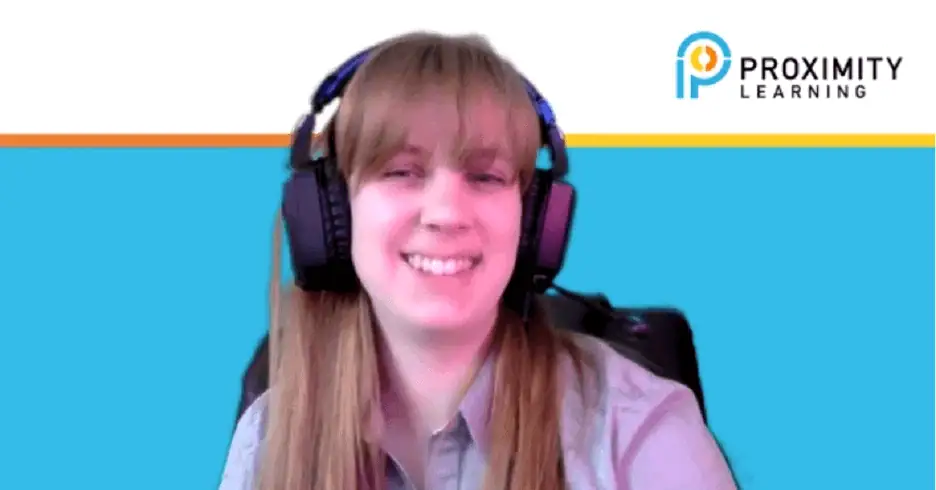 Student engaging in online learning with headphones in a virtual classroom setting.