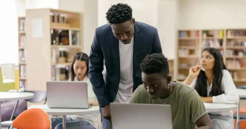 Students are sitting at desks in a classroom